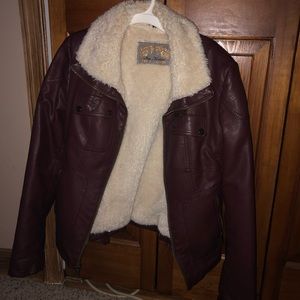 Leather jacket with faux fur lining